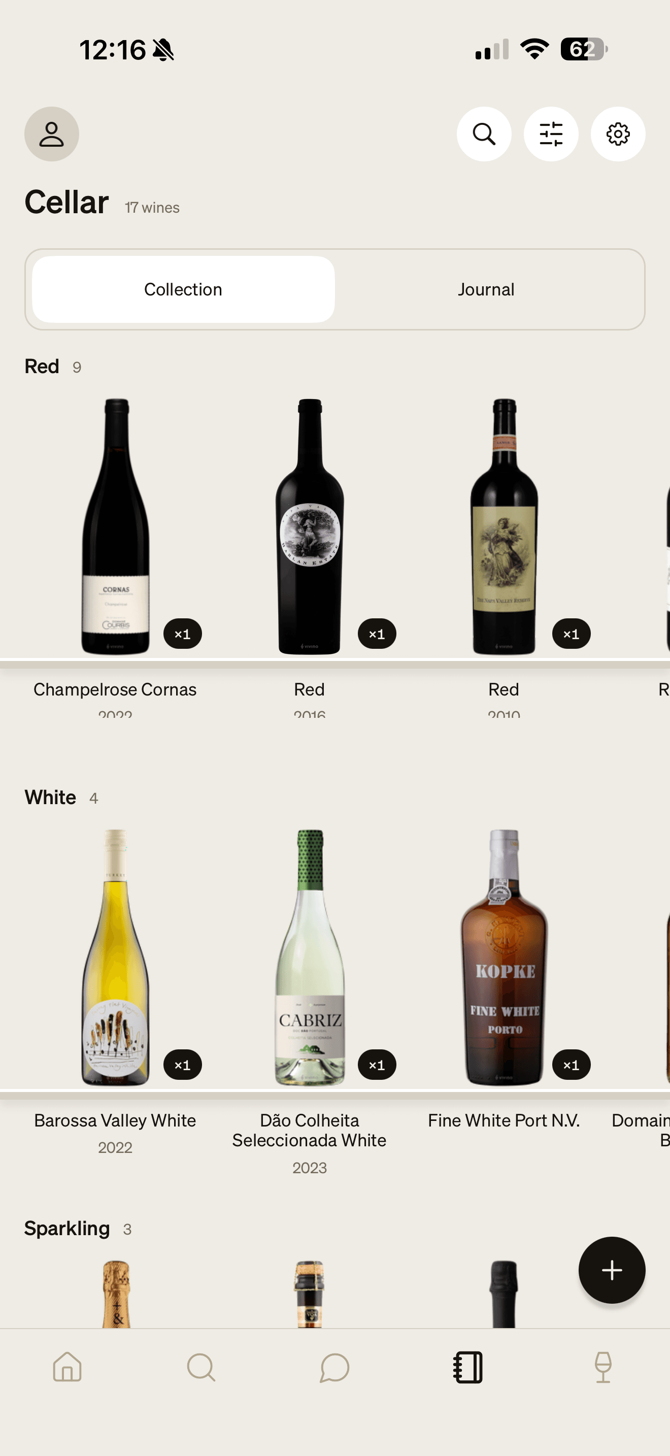 Valmont cellar collection displaying bottles on shelves, grouped into red, white and sparkling wines with names, vintages and quantities.